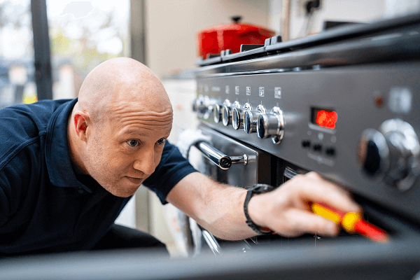 D&G engineer fixing an oven